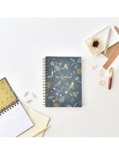 CUADERNO ILUSTRADO CON UN DISEÑO DE JUNGLA NOCTURNA CON UN COLOR OSCURO Y ENCUADERNADO EN ESPIRAL