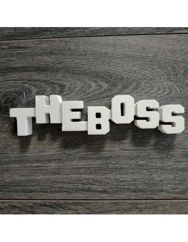 Letrero de madera con frase the boss...